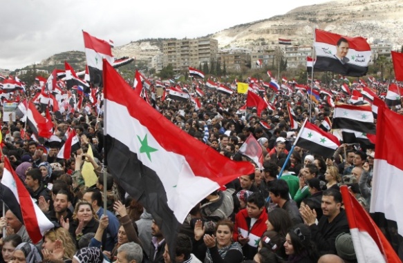 Gran manifestación en apoyo del presidente sirio Bachar Al Asad en la ciudad de Damasco. Fuente: Globedia.